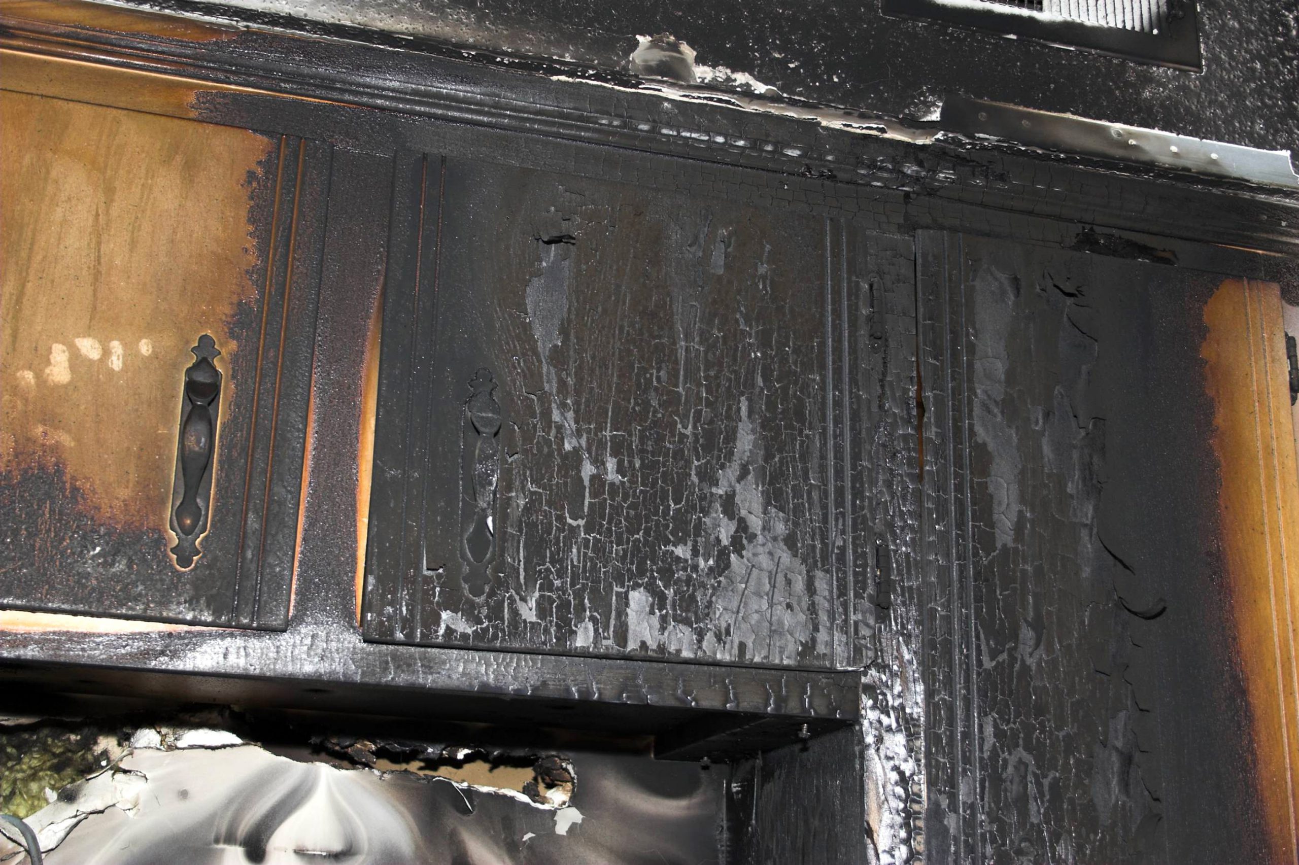 Kitchen damaged by fire and smoke
