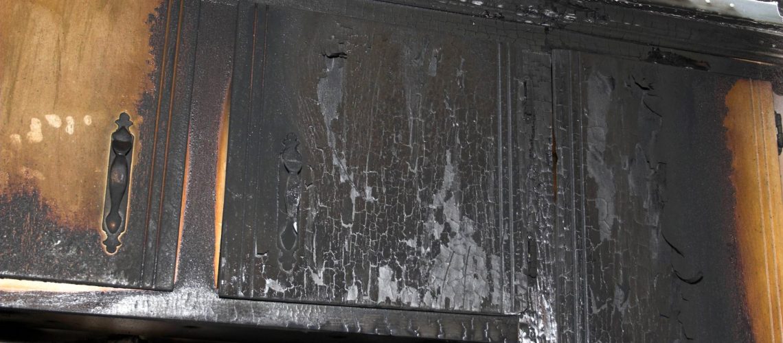 Kitchen damaged by fire and smoke